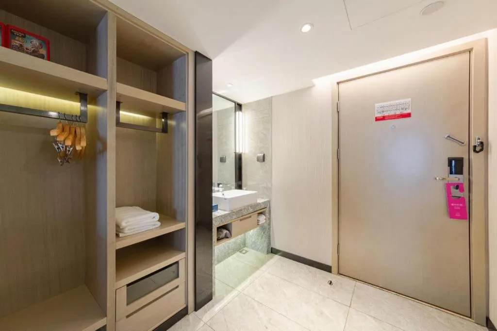 Bed in Echarm Hotel Wuhan Huangpi Xiangyang Avenue