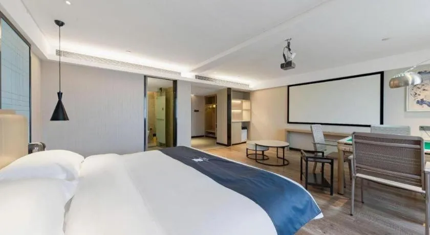 Bed in Echarm Hotel Wuhan Huangpi Xiangyang Avenue