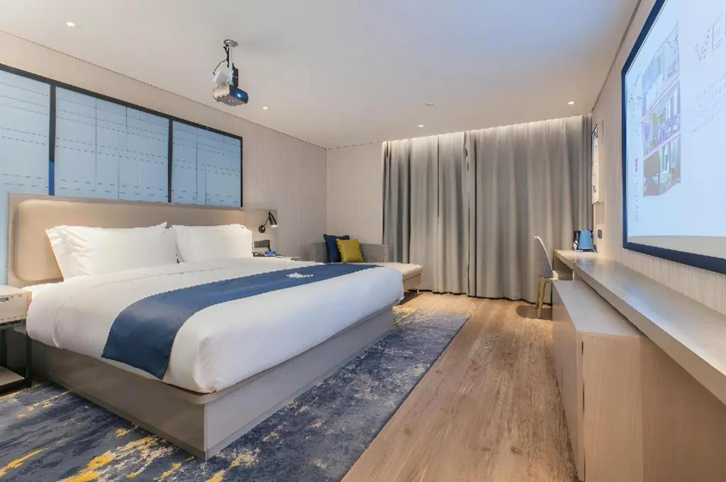 Bed in Echarm Hotel Wuhan Huangpi Xiangyang Avenue