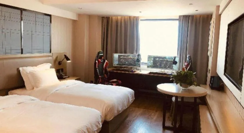 Bed in Echarm Hotel Wuhan Huangpi Xiangyang Avenue