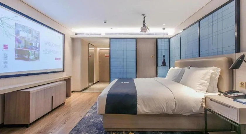 Bed in Echarm Hotel Wuhan Huangpi Xiangyang Avenue