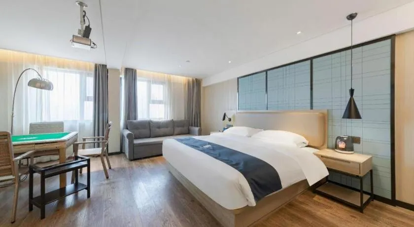 Bed in Echarm Hotel Wuhan Huangpi Xiangyang Avenue