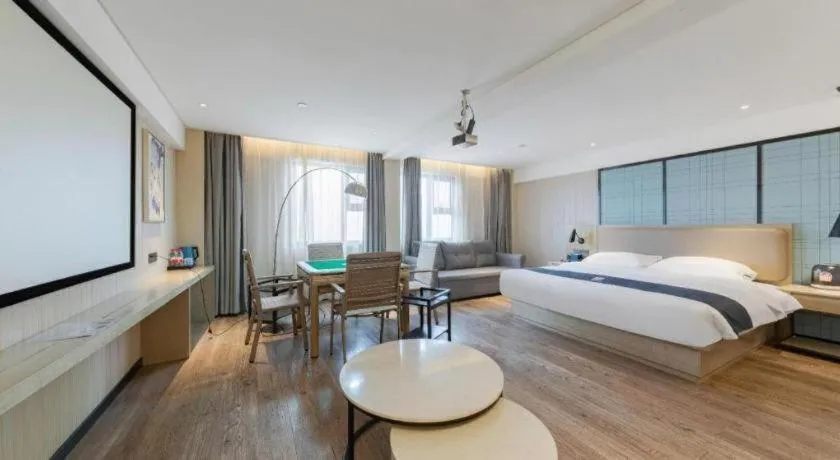 Bed in Echarm Hotel Wuhan Huangpi Xiangyang Avenue