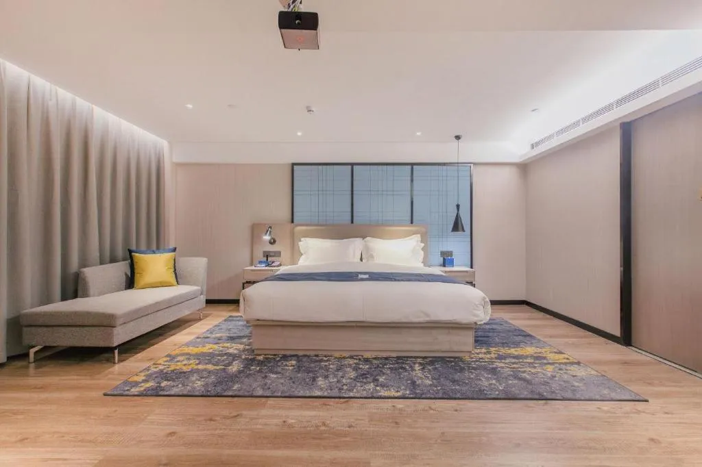 Bed in Echarm Hotel Wuhan Huangpi Xiangyang Avenue