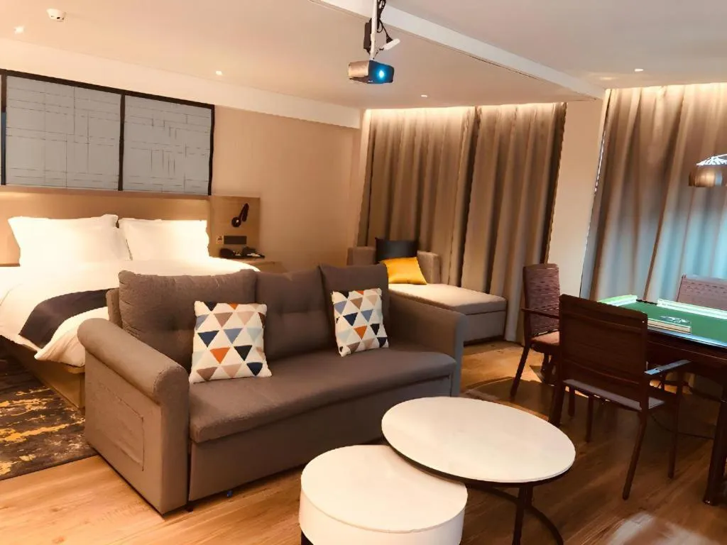 Bed in Echarm Hotel Wuhan Huangpi Xiangyang Avenue