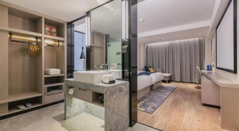 Bed in Echarm Hotel Wuhan Huangpi Xiangyang Avenue