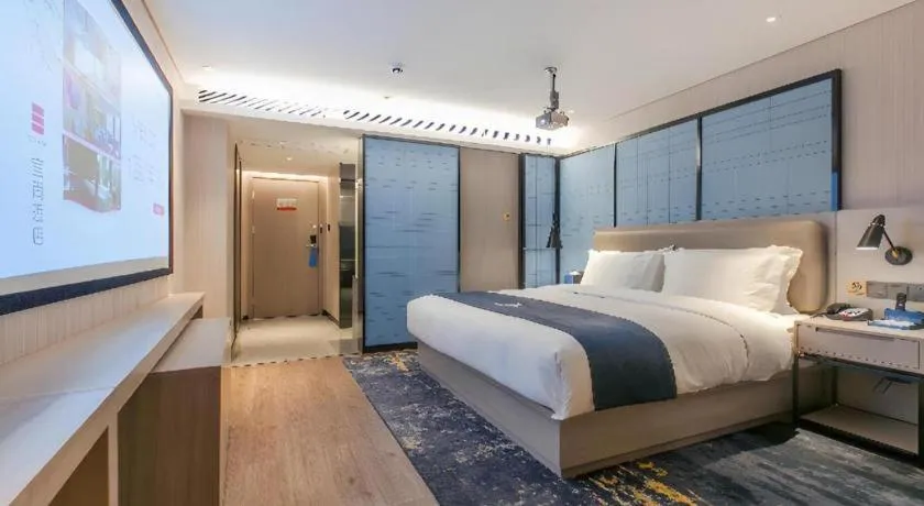 Bed in Echarm Hotel Wuhan Huangpi Xiangyang Avenue