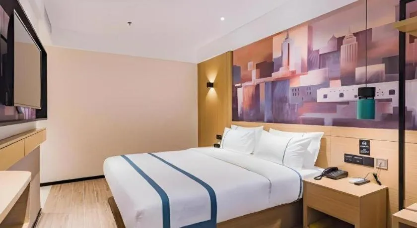 Bed in City Comfort Inn Dongguan Liaobu Jingtai Jiarong Shopping Plaza