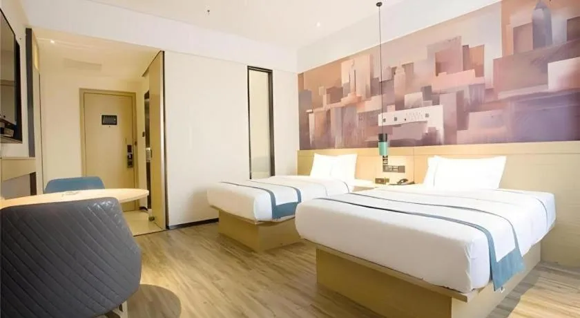 Bed in City Comfort Inn Dongguan Liaobu Jingtai Jiarong Shopping Plaza