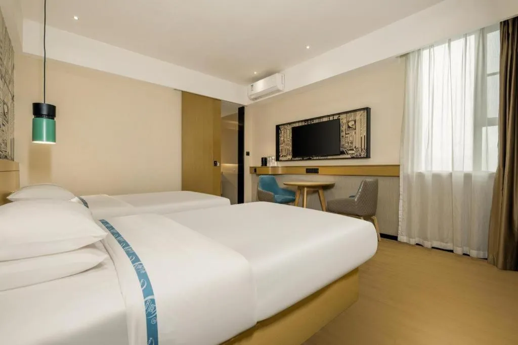 Bed in City Comfort Inn Xingye High-Speed Railway Station