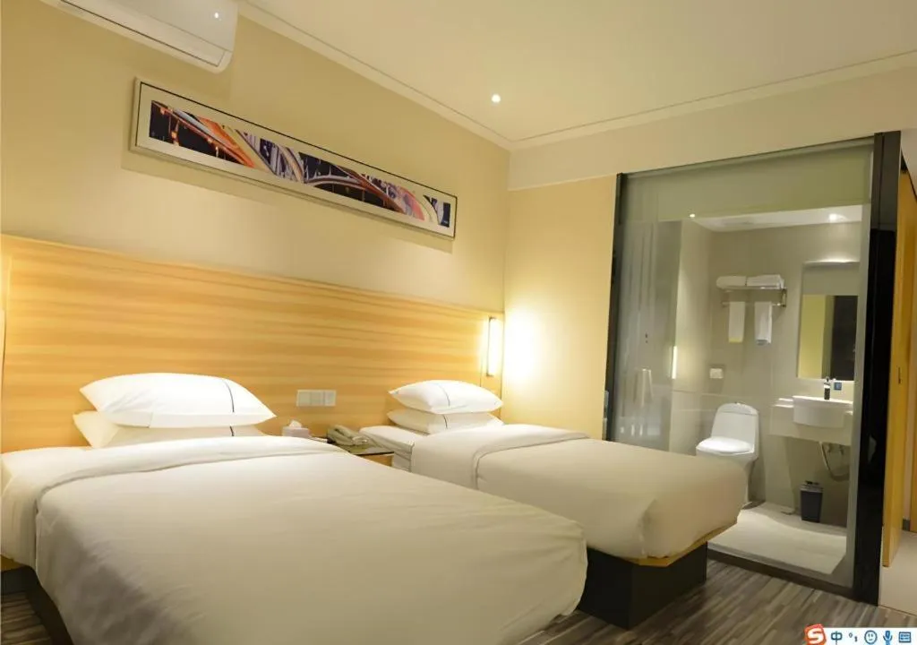 Bed in City Comfort Inn Wuhan Qingshan Jianshi Qingyiju Metro Station