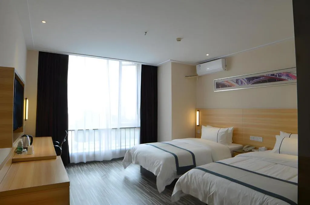 Bed in City Comfort Inn Wuhan Qingshan Jianshi Qingyiju Metro Station