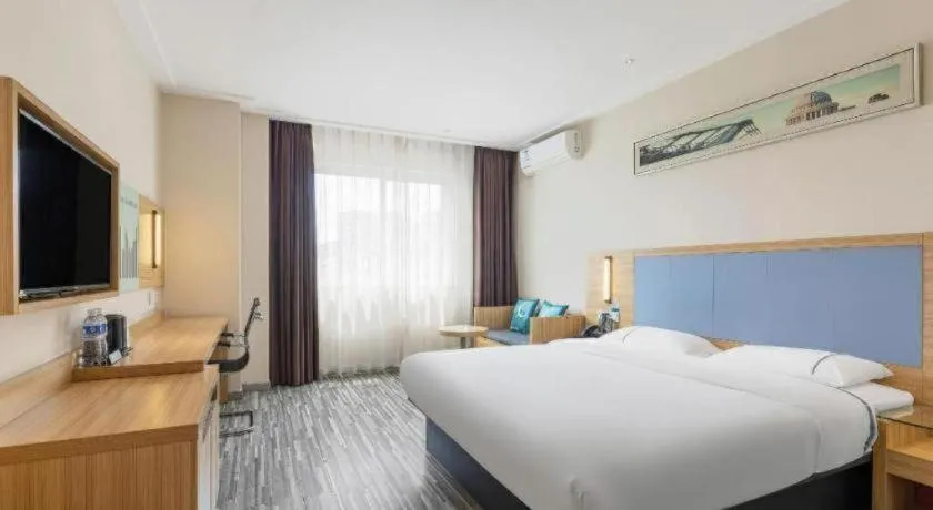 Bed in City Comfort Inn Wuhan Qingshan Jianshi Qingyiju Metro Station