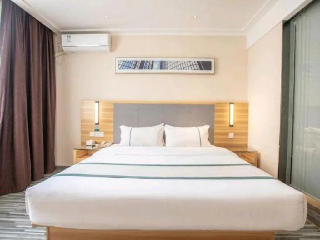 Bed in City Comfort Inn Hengyang Shigu Shuyuan