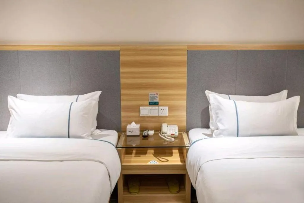 Bed in City Comfort Inn Hengyang Shigu Shuyuan