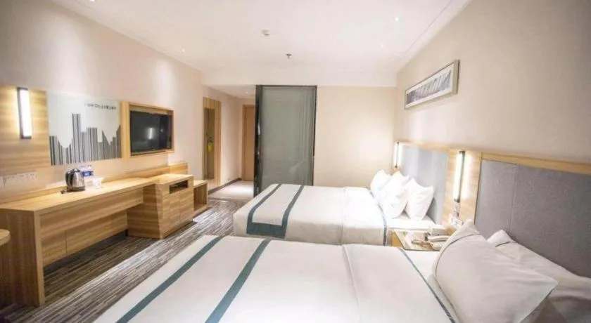 Bed in City Comfort Inn Hengyang Shigu Shuyuan