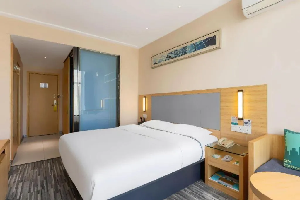 Bed in City Comfort Inn Hengyang Shigu Shuyuan