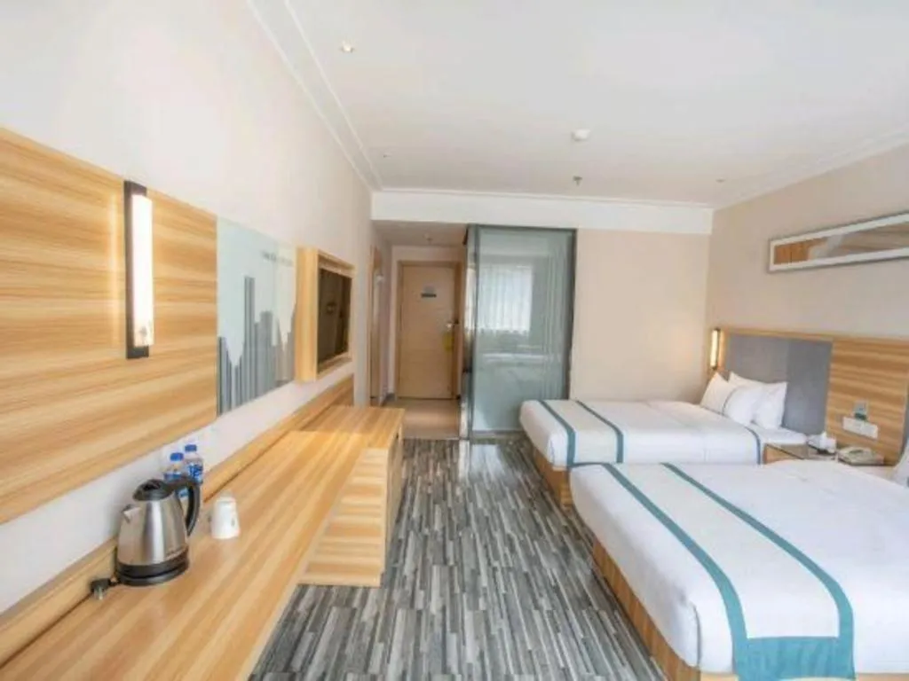 Bed in City Comfort Inn Hengyang Shigu Shuyuan