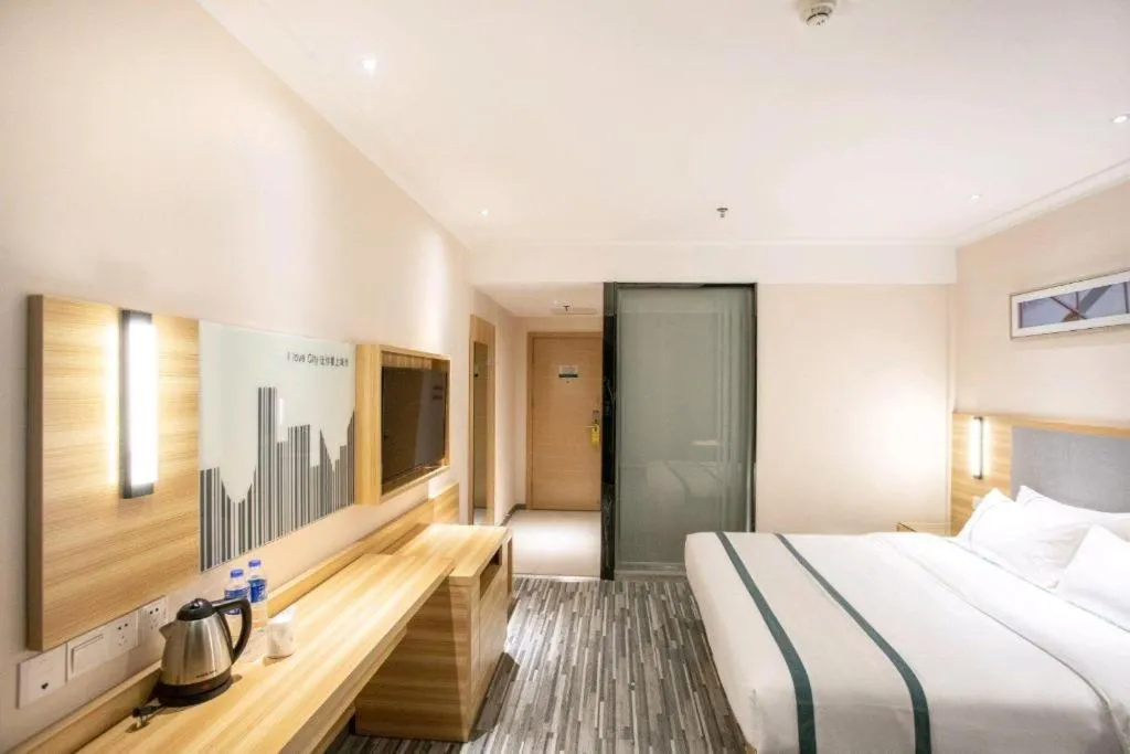 Bed in City Comfort Inn Hengyang Shigu Shuyuan