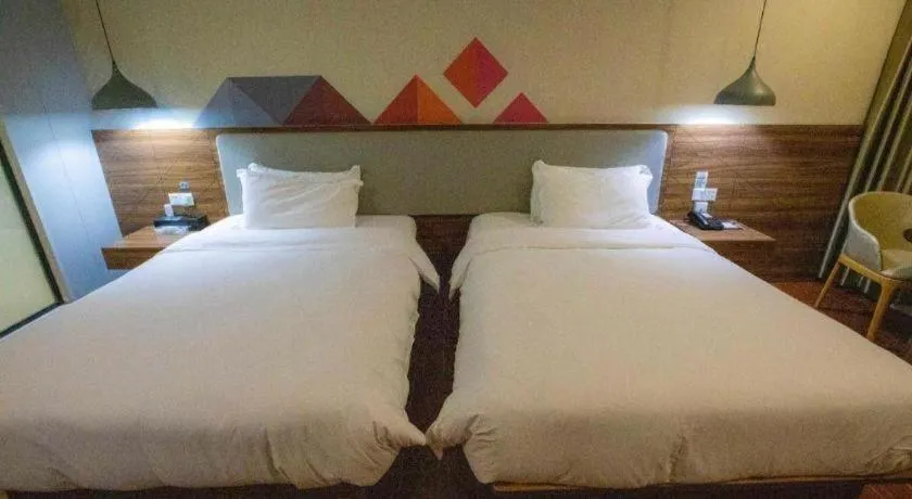 Bed in Borrman Hotel Shaoguan Century East Street Fengcai Building