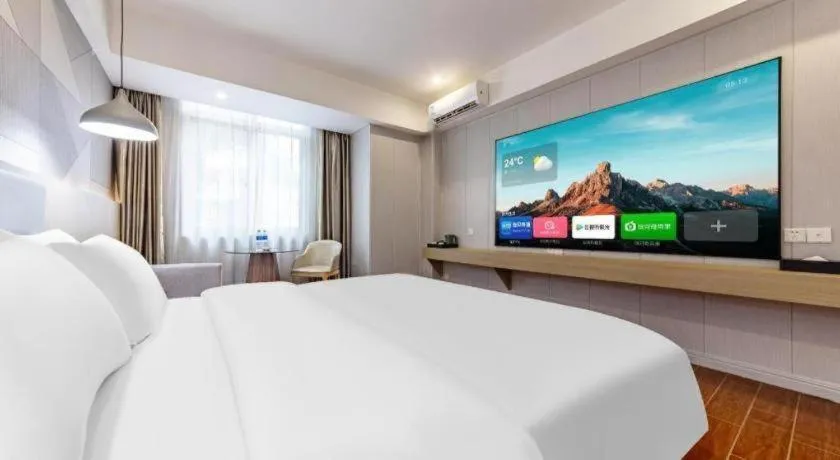 Bed in Borrman Hotel Shaoguan Century East Street Fengcai Building