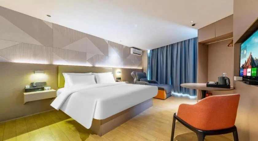 Bed in Borrman Hotel Shaoguan Century East Street Fengcai Building