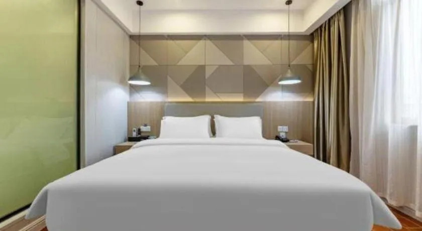 Bed in Borrman Hotel Shaoguan Century East Street Fengcai Building