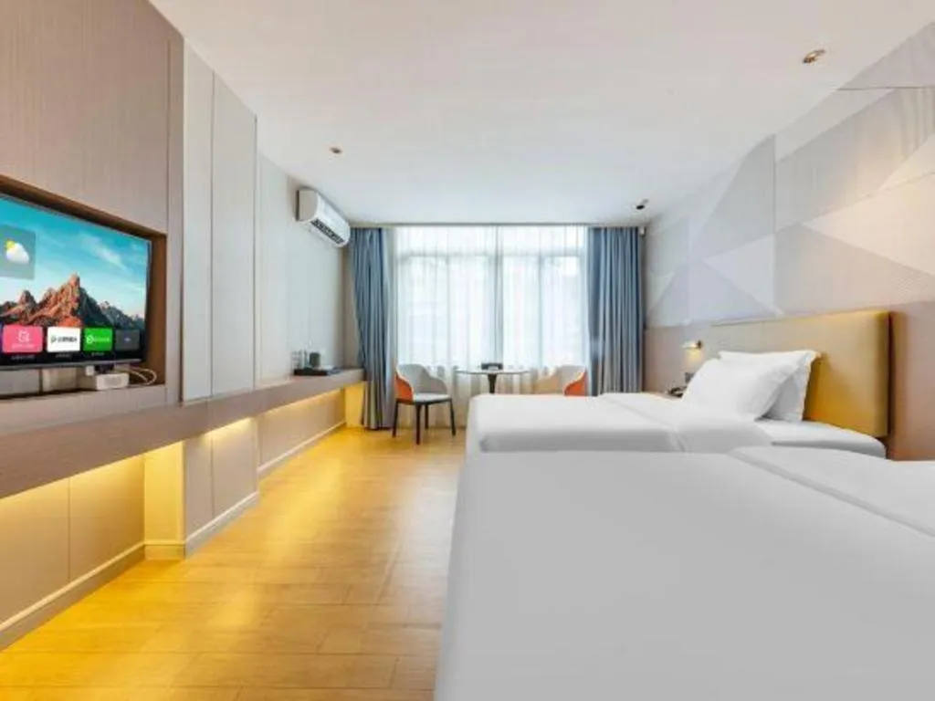 Bed in Borrman Hotel Shaoguan Century East Street Fengcai Building