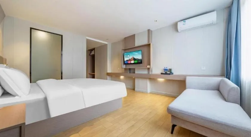 Bed in Borrman Hotel Shaoguan Century East Street Fengcai Building