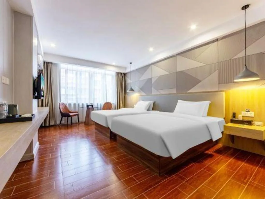 Bed in Borrman Hotel Shaoguan Century East Street Fengcai Building