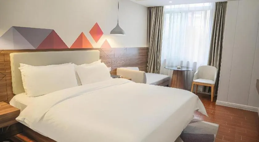 Bed in Borrman Hotel Shaoguan Century East Street Fengcai Building