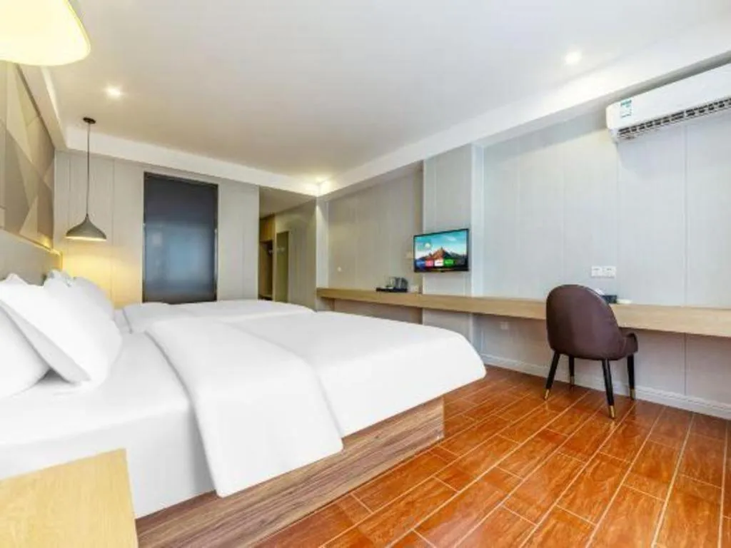 Bed in Borrman Hotel Shaoguan Century East Street Fengcai Building