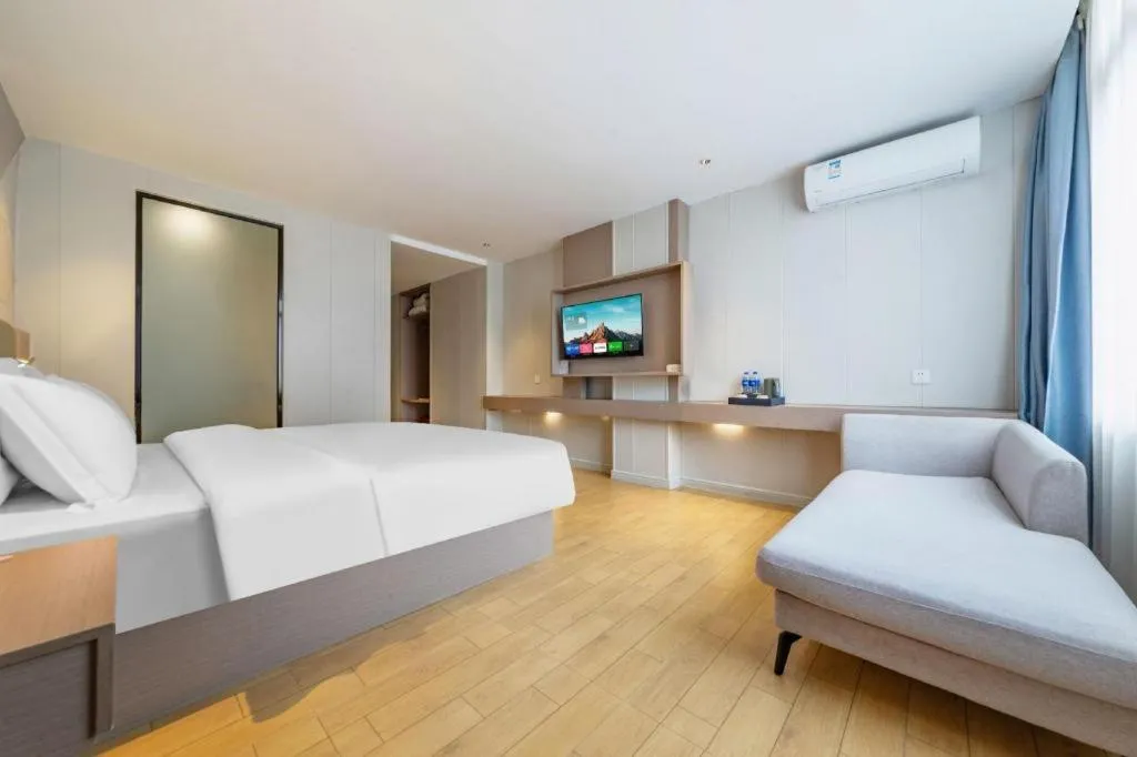 Bed in Borrman Hotel Shaoguan Century East Street Fengcai Building