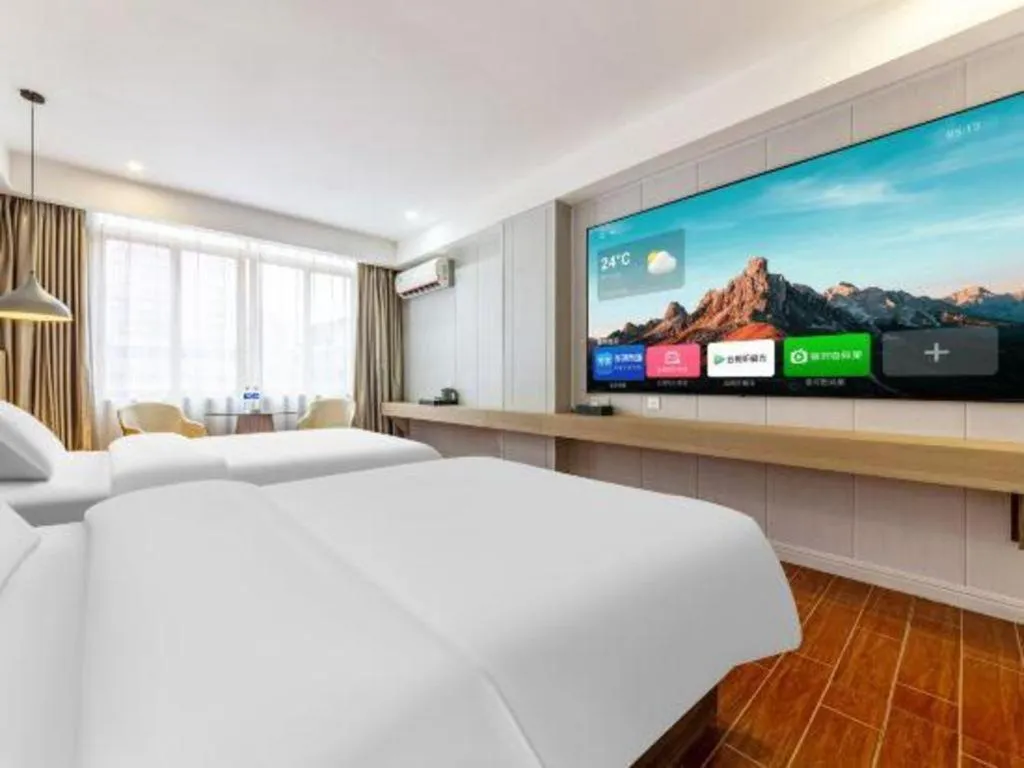 Bed in Borrman Hotel Shaoguan Century East Street Fengcai Building