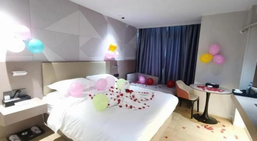Bed in Borrman Hotel Shaoguan Century East Street Fengcai Building