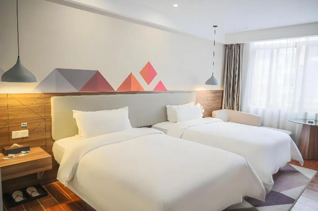 Bed in Borrman Hotel Shaoguan Century East Street Fengcai Building