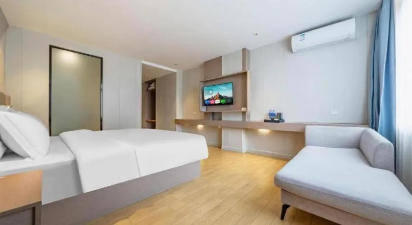 Bed in Borrman Hotel Shaoguan Century East Street Fengcai Building