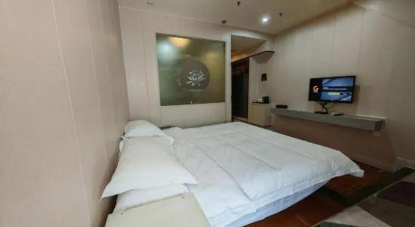 Bed in Borrman Hotel Shaoguan Century East Street Fengcai Building