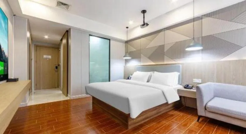 Bed in Borrman Hotel Shaoguan Century East Street Fengcai Building