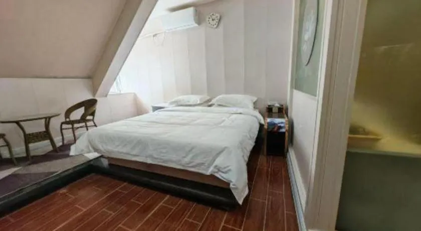 Bed in Borrman Hotel Shaoguan Century East Street Fengcai Building