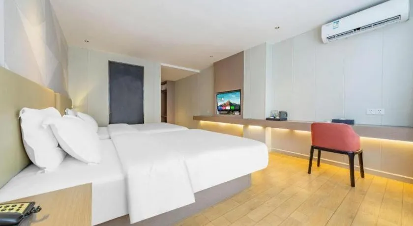 Bed in Borrman Hotel Shaoguan Century East Street Fengcai Building