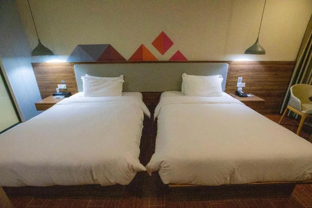 Bed in Borrman Hotel Shaoguan Century East Street Fengcai Building