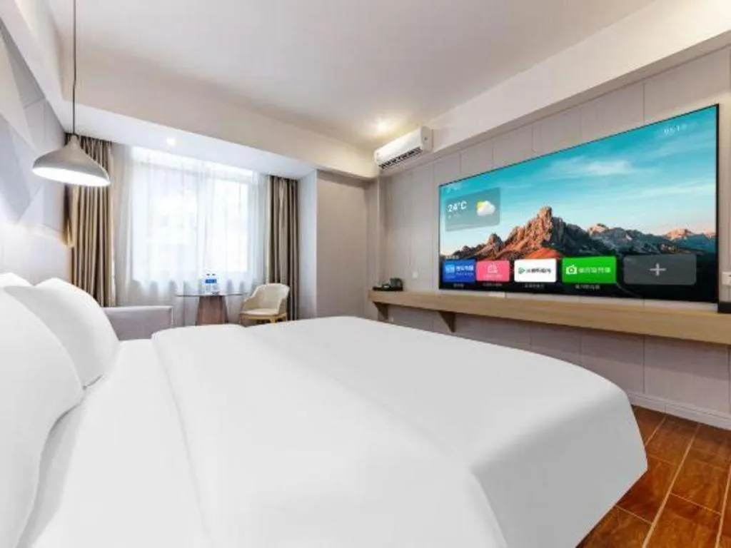 Bed in Borrman Hotel Shaoguan Century East Street Fengcai Building