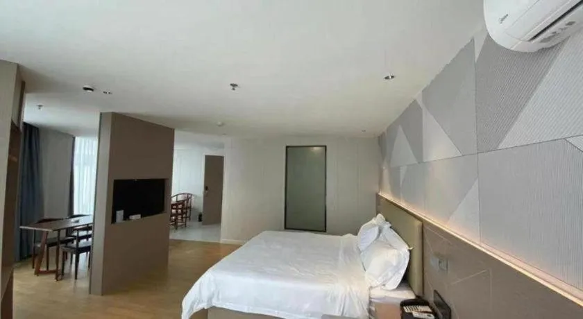 Bed in Borrman Hotel Shaoguan Century East Street Fengcai Building