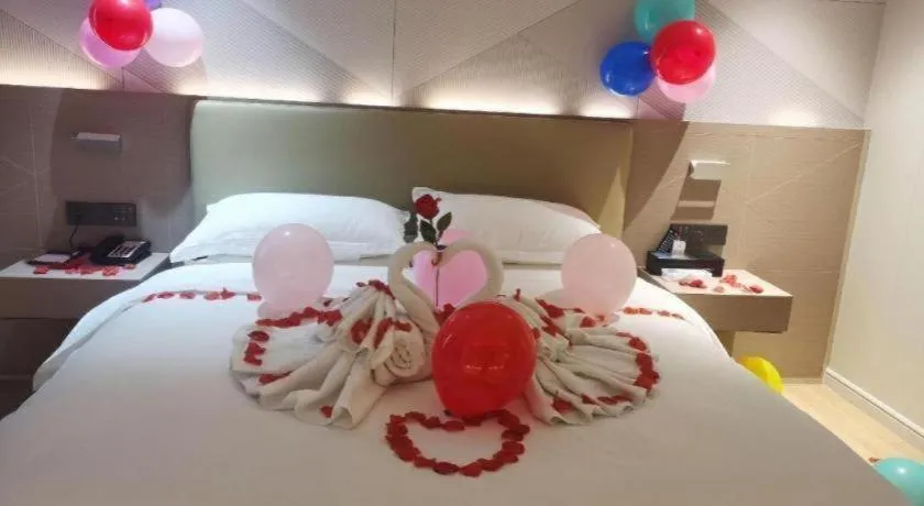 Bed in Borrman Hotel Shaoguan Century East Street Fengcai Building