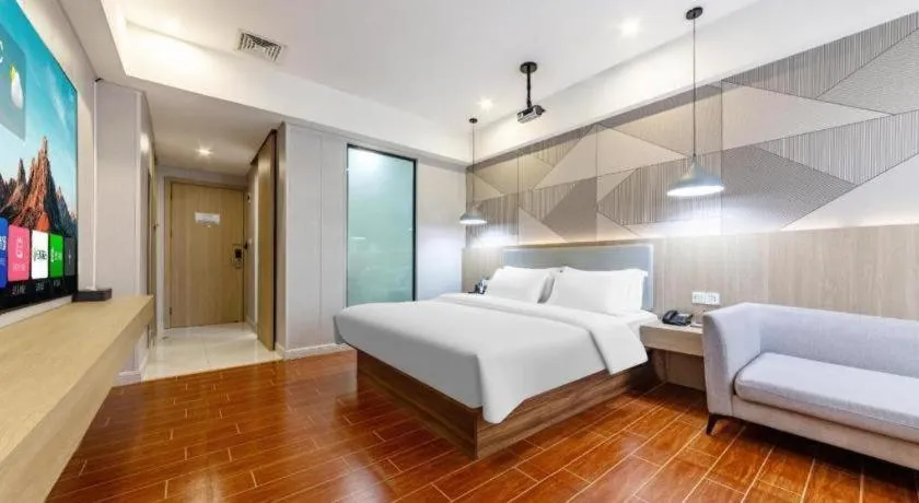 Bed in Borrman Hotel Shaoguan Century East Street Fengcai Building