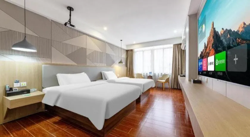 Bed in Borrman Hotel Shaoguan Century East Street Fengcai Building