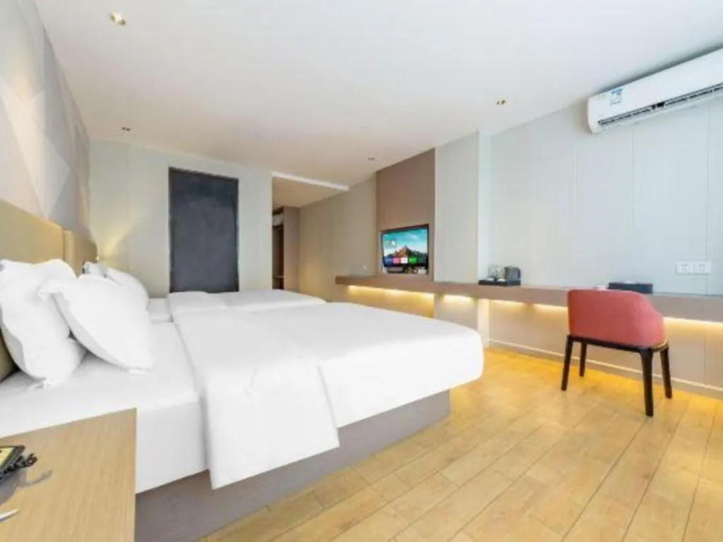 Bed in Borrman Hotel Shaoguan Century East Street Fengcai Building
