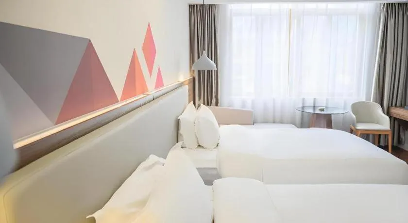 Bed in Borrman Hotel Shaoguan Century East Street Fengcai Building