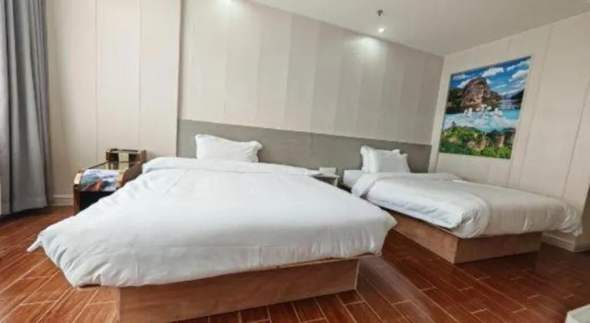 Bed in Borrman Hotel Shaoguan Century East Street Fengcai Building